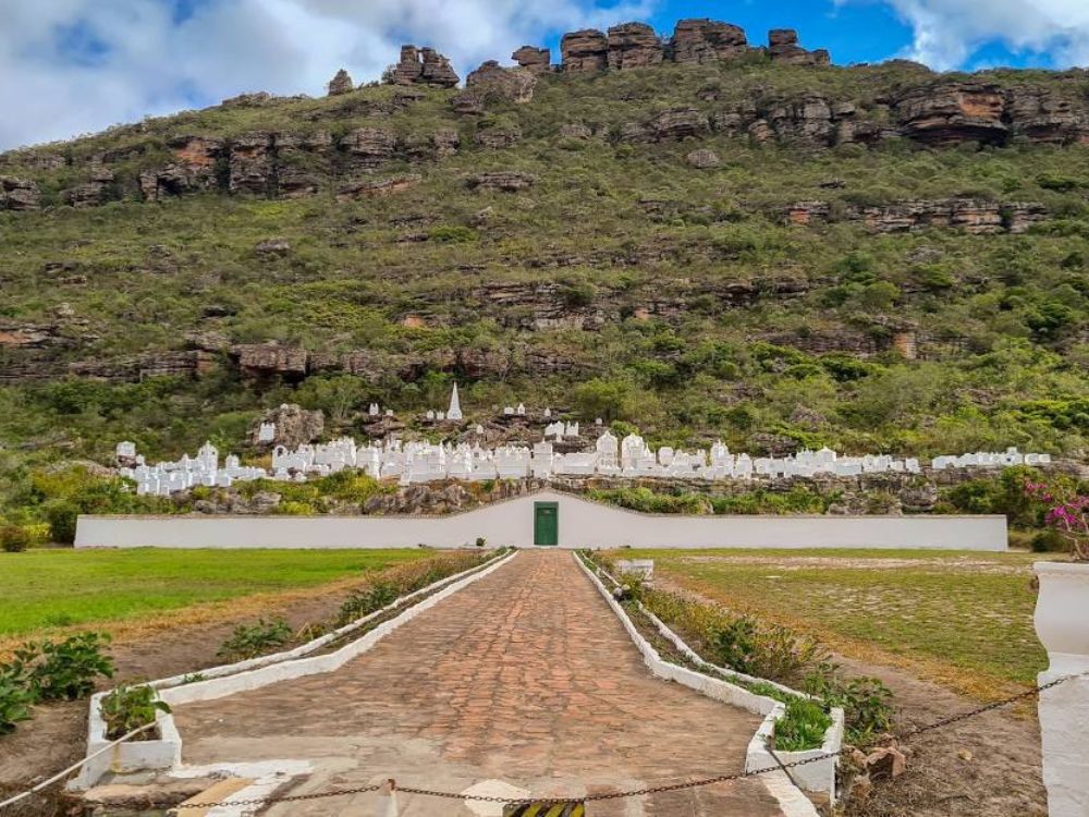 White tombstones of the Byzantine Cemetery built into a rocky mountain slope in Mucuge, Chapada Diamantina.